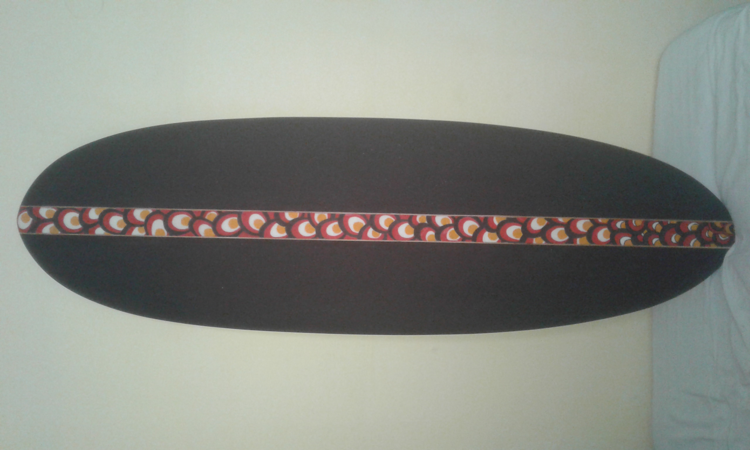 old windsurf board turns into a fun little thing. But how to glass it